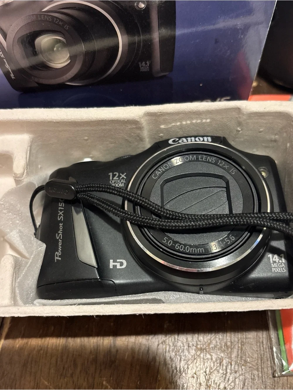 Canon Black Compact Digital Camera with Black Case and Accessories